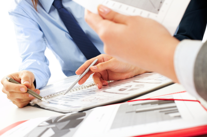 Discussing papers alternate text for this image