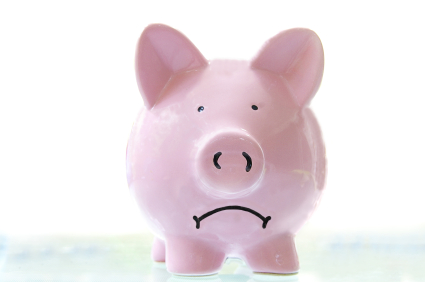 frowning pink piggy bank, on white alternate text for this image