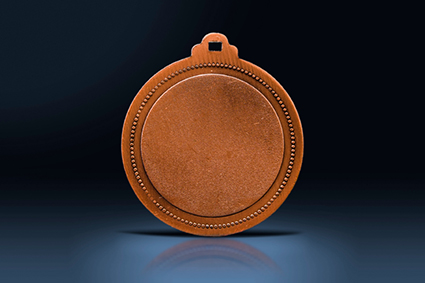 Medal in the spotlight alternate text for this image