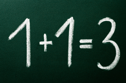 1+1=3 as mathematical calculations on green blackboard alternate text for this image