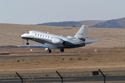 Private plane taking off ramp. alternate text for this image