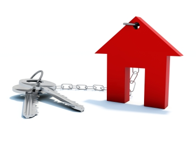 Red home with keys isolated on white alternate text for this image