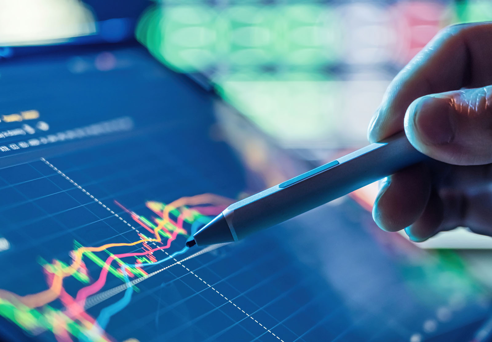 Businessman use tablet and smart phone for Stock Market alternate text for this image